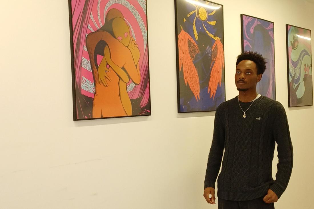 Kevon standing in the long gallery at the Hat Factory Arts Centre