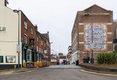 Image of Mark Titchner - If You Can Dream It, You Must Do It on the side of the Hat Factory Arts Centre in Luton