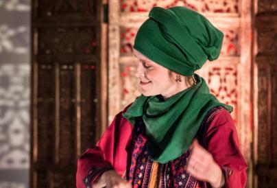 Female Muslin performer on stage